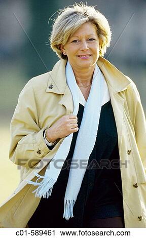 Mature woman strolling View Large Photo Image Stock Image - Mature woman strolling. Fotosearch