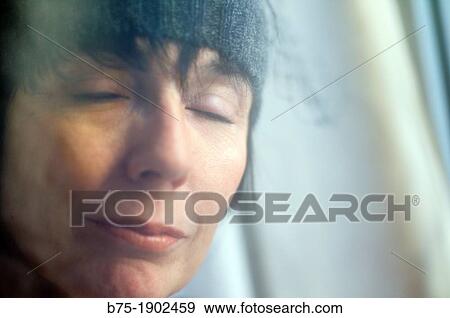 mature woman with eyes closed and relaxed expression View Large Photo Image Stock Photo - mature woman with eyes closed and relaxed expression. Fotosearch