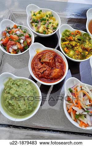 Stock Image - Mauritius, Palmar, spicy sauces served at the Ambre Hotel. Fotosearch