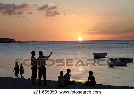 Mauritius, Trou aux Biches, beach, sunset, people View Large Photo Image Stock Image - Mauritius, Trou aux Biches, beach, sunset, people. Fotosearch