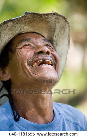 Stock Photography - Mayan man laughing. Fotosearch