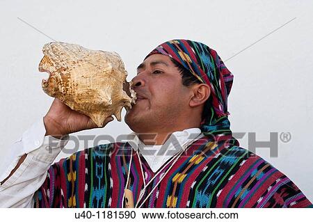 Mayan Man playing Conch View Large Photo Image Stock Image - Mayan Man playing Conch. Fotosearch