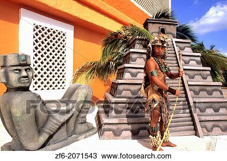 Stock Image - Mayan native in colorful costume in Cozumel Mexico.. Fotosearch