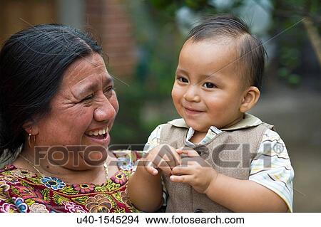 Mayan woman with grandson View Large Photo Image Picture - Mayan woman with grandson. Fotosearch