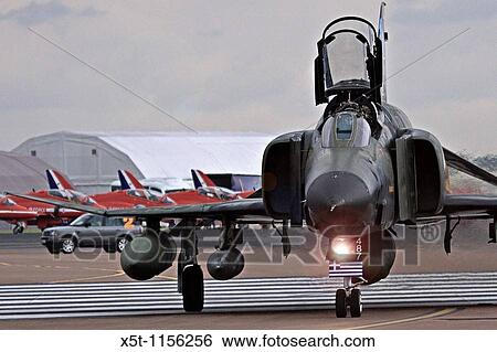 McDonnell Douglas F-4 Phantom II long-range supersonic jet interceptor fighter/fighter-bomber View Large Photo Image Stock Photograph - McDonnell Douglas F-4 Phantom II long-range supersonic jet interceptor fighter/fighter-bomber. Fotosearch