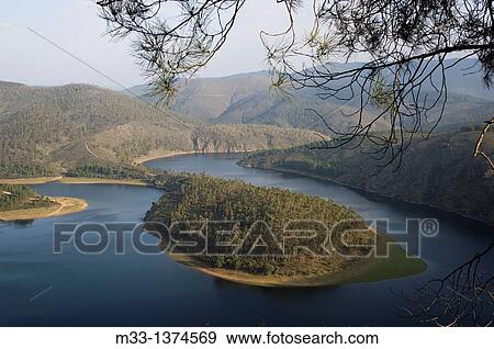 Stock Photo - Meander Melero, Alagon river, Las Hurdes area, Caceres province, Extremadura region, Spain.. Fotosearch