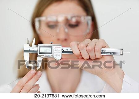Measuring gauge. Researcher. Technology and Research Centre, Technological Park, San Sebastian, Donostia, Gipuzkoa, Basque Country, Spain View Large Photo Image Stock Image - Measuring gauge. Researcher. Technology and Research Centre, Technological Park, San Sebastian, Donostia, Gipuzkoa, Basque Country, Spain. Fotosearch