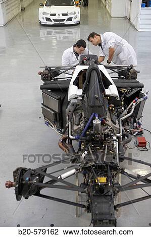 Mechanics working on racing car, World Series, Formula 3000. Epsilon Euskadi, car technology high performance centre, Azkoitia, Gipuzkoa, Basque Country View Large Photo Image Stock Image - Mechanics working on racing car, World Series, Formula 3000. Epsilon Euskadi, car technology high performance centre, Azkoitia, Gipuzkoa, Basque Country. Fotosearch