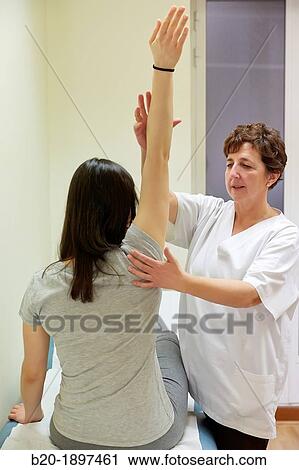 Medical checking shoulder flexion, Physiotherapy medical center, Donostia, San Sebastian, Gipuzkoa, Basque Country, Spain View Large Photo Image Stock Image - Medical checking shoulder flexion, Physiotherapy medical center, Donostia, San Sebastian, Gipuzkoa, Basque Country, Spain. Fotosearch
