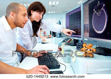 Stock Image - Medical image analysis, cranial CT scan, Health and Biomedical applications, Vicomtech IK4, Centro de tecnologias de Interaccion Visual y Comunicaciones. Fotosearch