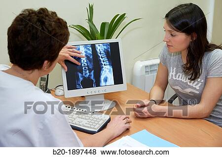 Medical informing patient Column X-ray image, Physiotherapy medical center, Donostia, San Sebastian, Gipuzkoa, Basque Country, Spain View Large Photo Image Stock Photo - Medical informing patient Column X-ray image, Physiotherapy medical center, Donostia, San Sebastian, Gipuzkoa, Basque Country, Spain. Fotosearch