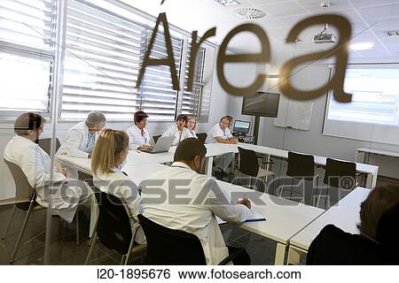 Stock Photograph - Medical meeting, clinical session, Onkologikoa Hospital, Oncology Institute, Case Center for prevention, diagnosis and treatment of cancer, Donostia, San Sebastian, Gipuzkoa, Basque Country, Spain. Fotosearch