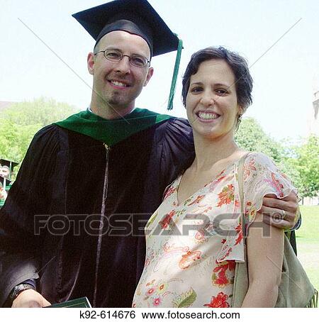 Medical school graduate and his seven month pregnant wife View Large Photo Image Stock Photograph - Medical school graduate and his seven month pregnant wife. Fotosearch