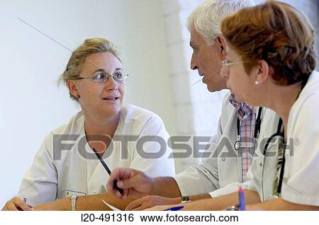 Medical staff meeting. Hospital Universitario Gran Canaria Doctor Negrin, Las Palmas de Gran Canaria. Canary Islands, Spain View Large Photo Image Stock Photograph - Medical staff meeting. Hospital Universitario Gran Canaria Doctor Negrin, Las Palmas de Gran Canaria. Canary Islands, Spain. Fotosearch