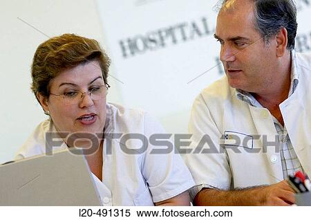 Medical staff meeting. Hospital Universitario Gran Canaria Doctor Negrin, Las Palmas de Gran Canaria. Canary Islands, Spain View Large Photo Image Stock Photography - Medical staff meeting. Hospital Universitario Gran Canaria Doctor Negrin, Las Palmas de Gran Canaria. Canary Islands, Spain. Fotosearch