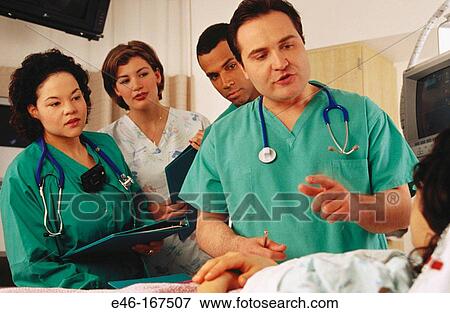 Medical staff visiting patient View Large Photo Image Stock Photo - Medical staff visiting patient. Fotosearch