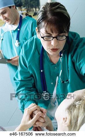 Medical staff visiting patient View Large Photo Image Stock Photograph - Medical staff visiting patient. Fotosearch