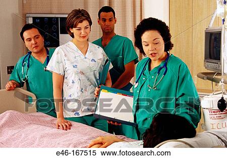 Medical staff visiting patient View Large Photo Image Stock Photography - Medical staff visiting patient. Fotosearch