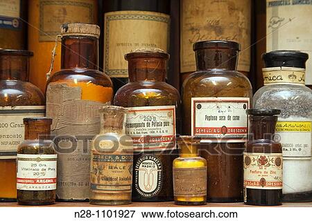 Stock Photo - Medicine bottles in the old pharmacy of the Hospital Noble de MBlaga. Andalusia, Spain. Fotosearch