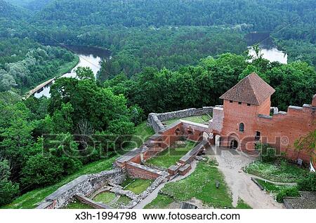 Medieval brick castle overhanging the Gauja River, Turaida Museum Reserve, Sigulda, Gauja National Park, Vidzeme Region, Latvia, Baltic region, Northern Europe. View Large Photo Image Stock Photo - Medieval brick castle overhanging the Gauja River, Turaida Museum Reserve, Sigulda, Gauja National Park, Vidzeme Region, Latvia, Baltic region, Northern Europe.. Fotosearch