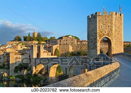 Medieval Bridge (11th Century), in Besalu, a medieval village declarated Historical-Artistic Site, ubicated in La Garrotxa, Girona province. Catalonia; Spain. View Large Photo Image Stock Image - Medieval Bridge (11th Century), in Besalu, a medieval village declarated Historical-Artistic Site, ubicated in La Garrotxa, Girona province. Catalonia; Spain.. Fotosearch