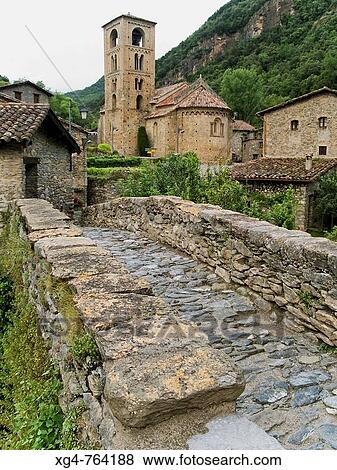 Medieval bridge and church of Sant Cristofol, Beget. Alta Garrotxa, Girona province, Catalonia, Spain View Large Photo Image Stock Photo - Medieval bridge and church of Sant Cristofol, Beget. Alta Garrotxa, Girona province, Catalonia, Spain. Fotosearch