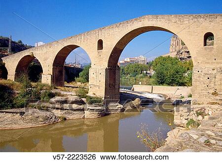 Medieval bridge over river Cardener. Manresa, Barcelona province, Catalonia, Spain. View Large Photo Image Stock Photograph - Medieval bridge over river Cardener. Manresa, Barcelona province, Catalonia, Spain.. Fotosearch