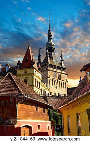 Medieval clock tower & gate of Sighisoara Saxon fortified medieval citadel, Transylvania, Romania View Large Photo Image Stock Photo - Medieval clock tower & gate of Sighisoara Saxon fortified medieval citadel, Transylvania, Romania. Fotosearch