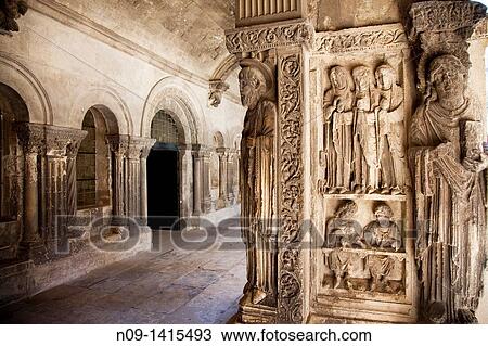 Medieval stone galleries built in the 13th Century at the Cathedral of St Trophimus in Arles, France View Large Photo Image Stock Image - Medieval stone galleries built in the 13th Century at the Cathedral of St Trophimus in Arles, France. Fotosearch