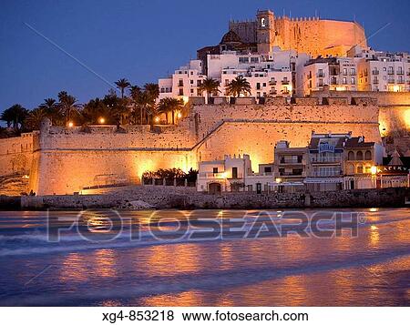 Mediterranean Sea and antipope Benedict XIII? s castle at dusk, Peiscola. Baix Maestrat, Castellon province, Comunidad Valenciana, Spain View Large Photo Image Stock Photo - Mediterranean Sea and antipope Benedict XIII? s castle at dusk, Peiscola. Baix Maestrat, Castellon province, Comunidad Valenciana, Spain. Fotosearch