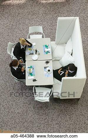 Meeting having coffee. Nuevo Mundo Lima Hotel. Lima. Per. View Large Photo Image Stock Photo - Meeting having coffee. Nuevo Mundo Lima Hotel. Lima. Per.. Fotosearch