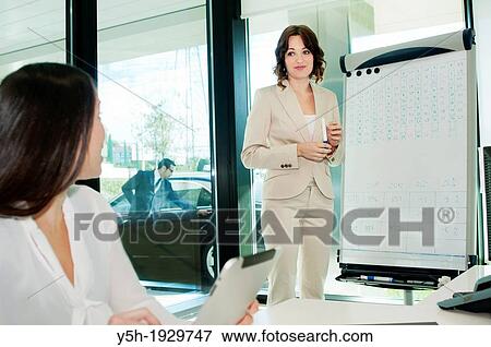 Meeting in an office View Large Photo Image Stock Photo - Meeting in an office. Fotosearch