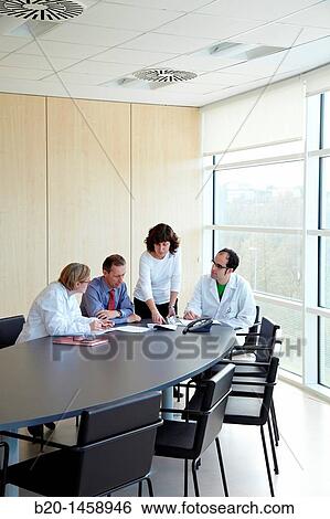 Stock Photograph - Meeting room, research lab, IkerChem research lab, design and synthesis of new chemical entities with therapeutic applications in oncology, discovery and development of novel drugs for the treatment of cancer. Fotosearch