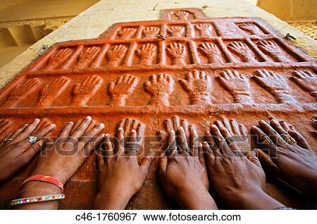 Stock Photo - Meherangarh Fort,? Sati? Marks of the widows of Majarajah Ma Singh, who threw themselves on his funeral pyre in 1843 Jodhpur Rajasthan India.. Fotosearch