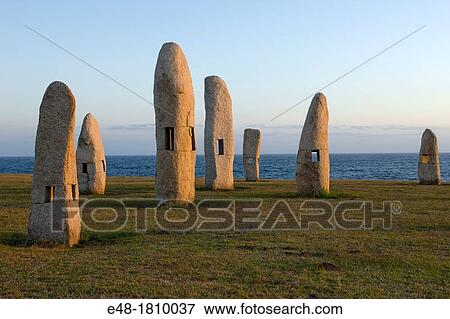 MEHIRS STANDING STONES MONUMENT PASEO DOS MENHIRES SCULPTURE PARK LA CORUNA GALICIA SPAIN View Large Photo Image Stock Photo - MEHIRS STANDING STONES MONUMENT PASEO DOS MENHIRES SCULPTURE PARK LA CORUNA GALICIA SPAIN. Fotosearch