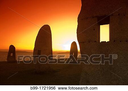 Stock Photograph - MEHIRS STANDING STONES MONUMENT PASEO DOS MENHIRES SCULPTURE PARK LA CORUNA GALICIA SPAIN. Fotosearch