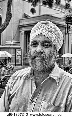Stock Image - Melaka Malaysia Hertiage City local bearded man Main Square downtown artists area. Fotosearch