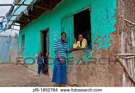 Melka Country Ethiopia Africa Oromo Tribe young women in window of small restaurant in poor area 3 View Large Photo Image Picture - Melka Country Ethiopia Africa Oromo Tribe young women in window of small restaurant in poor area 3. Fotosearch