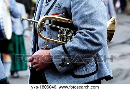Member of a typical bavarians drum band in Oktoberfest in Munich, close-up of trumpet, Germany View Large Photo Image Stock Photograph - Member of a typical bavarians drum band in Oktoberfest in Munich, close-up of trumpet, Germany. Fotosearch