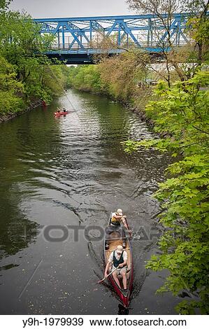 Members of the Bronx River Alliance and supporters participate in canoe races in the Bronx River in the New York borough of The Bronx during the 14th Annual Bronx River Flotilla. View Large Photo Image Stock Photo - Members of the Bronx River Alliance and supporters participate in canoe races in the Bronx River in the New York borough of The Bronx during the 14th Annual Bronx River Flotilla. . Fotosearch
