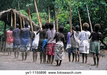 Members of the John Frum cargo cult training in preparation for the annual parade of the Tannese Army, Sulphur Bay, Tanna, Vanuatu. View Large Photo Image Stock Photograph - Members of the John Frum cargo cult training in preparation for the annual parade of the Tannese Army, Sulphur Bay, Tanna, Vanuatu.. Fotosearch