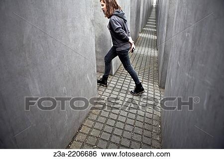 Memorial to the Murdered Jews of Europe in Berlin used by youth as a playground. View Large Photo Image Stock Photograph - Memorial to the Murdered Jews of Europe in Berlin used by youth as a playground.. Fotosearch