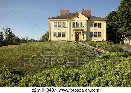 Stock Photo - Memorial Town Hall Located in Georgetown, Massachusetts USA, which is in scenic New England Notes: Originally built as an eight room schoolhouse. Fotosearch