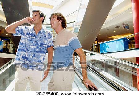 Men in shopping center View Large Photo Image Stock Image - Men in shopping center. Fotosearch