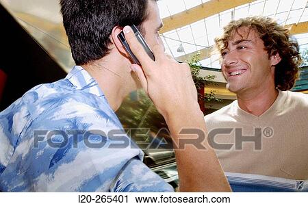 Men in shopping center View Large Photo Image Stock Image - Men in shopping center. Fotosearch