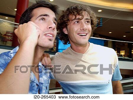 Men in shopping center View Large Photo Image Stock Image - Men in shopping center. Fotosearch
