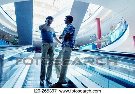 Men in shopping center View Large Photo Image Stock Photo - Men in shopping center. Fotosearch