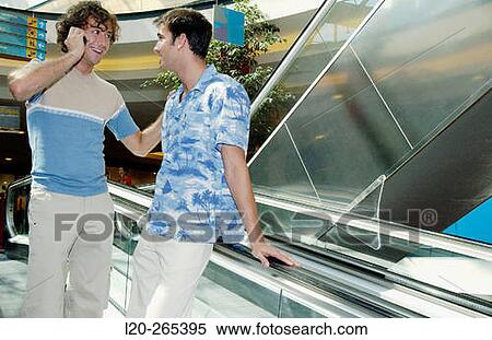 Men in shopping center View Large Photo Image Stock Photography - Men in shopping center. Fotosearch