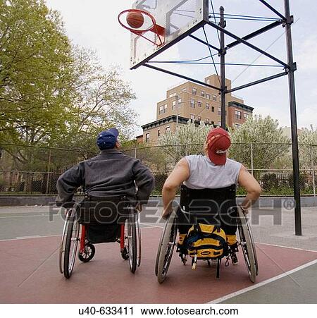 Men in wheelchairs playing basketball View Large Photo Image Stock Image - Men in wheelchairs playing basketball. Fotosearch