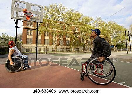 Men in wheelchairs playing basketball View Large Photo Image Stock Photography - Men in wheelchairs playing basketball. Fotosearch